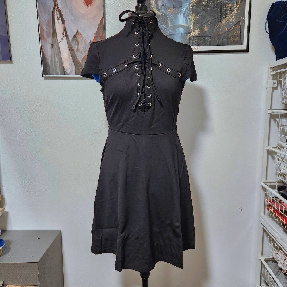 Black knee-length dress with lace-up high neck and cap sleeves size Medium